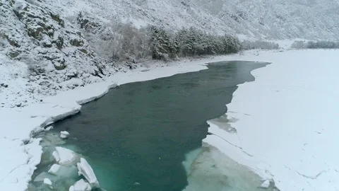 Aerial view of winter mountain river ice 1 Stock Footage 88147210