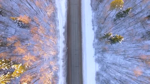 Aerial view on the winter road, which splits to forest. Stock Footage 144939548