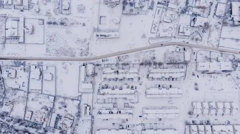 Aerial view on winter town. Many houses Stock Photos