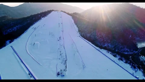 Aerial View of Winter Wide Snow Ground Mountain Road in Shennongjia Hubei China Stock Footage 337939751