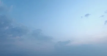 Aerial View of Wispy Clouds Drifty By. 4k video Stock Footage 85604250