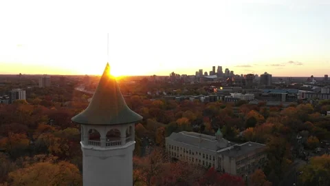 Aerial View of Witch's Hat Tower &amp; Downtown Minneapolis during Sunset (Autumn) Stock Footage 141299699