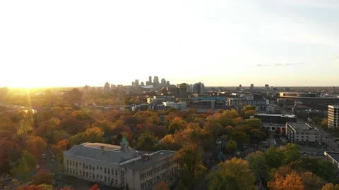Aerial View of Witch's Hat Tower &amp; Downtown Minneapolis during Sunset (Autumn) Stock Footage 141299922