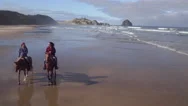 Aerial View Of Women Riding Horses At Beach Stock Footage