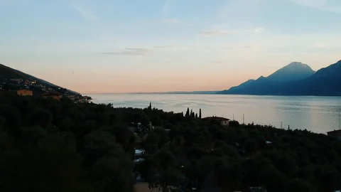 Aerial view on wonderful panoramic view on sunset over beautiful lake Garda. Stock Footage 92201416