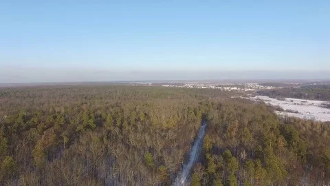 Aerial view of woods, fields and the frozen river in winter Stockbeeldmateriaal 71444108