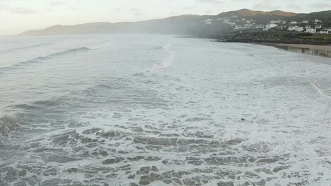 Aerial view of Woolacombe from above breaking waves Video stock 126257557