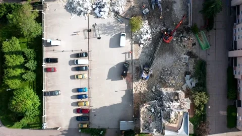 Aerial view of the work of old apartment building demolishing Stock Footage 160260537