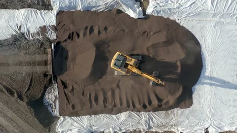 Aerial view of work in a road constructions site. Excavator and construction wor Stock Footage 158972054