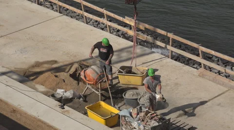 Aerial view worker man work construction site concrete cement machine mixing day Stock Footage 41478074