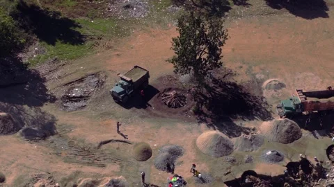 Aerial view of workers at a sand mining operation in Haiti Stock Footage 328836469