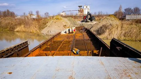 Aerial view on workers as they manually cutting old ship with blowtorch Stock Photos