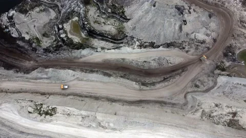 Aerial view of working open mine pit. Drone shot of coal mining activity Stock Footage 165308779