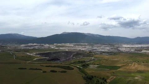 Aerial view of working open mine pit. Drone shot of coal mining activity Stock Footage 165324901