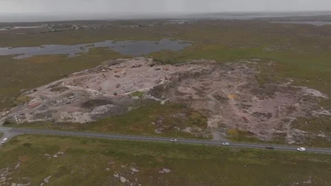 Aerial View Of Working Stone Quarry In Connemara Ireland With Road Traffic Stock Footage 345311487