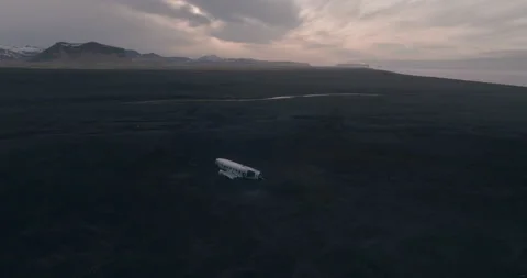 Aerial View of Wrecked plane on the beach Stock Footage 228652310