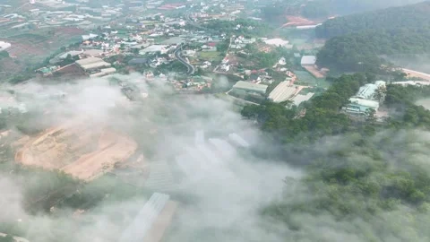Aerial view of the Xuan Tho suburbs near Da Lat city at morning Stock Footage 242467853