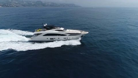 Aerial view of a yacht navigating Stock Footage 76256409