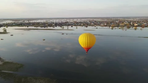 Aerial view of a yellow balloon Stock Footage 193811690