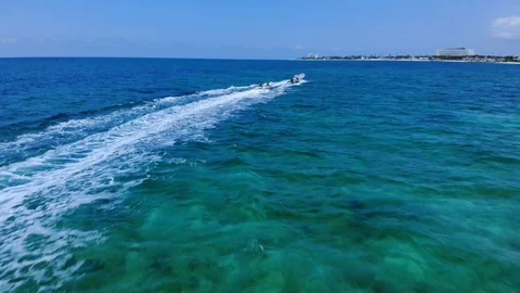 Aerial View of Yellow Flying Fish Towable Ride at Taino Beach, Bahamas Stock Footage 108729480