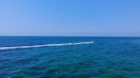 Aerial View of Yellow Flying Fish Towable Ride at Taino Beach, Bahamas Stock Footage 108729706