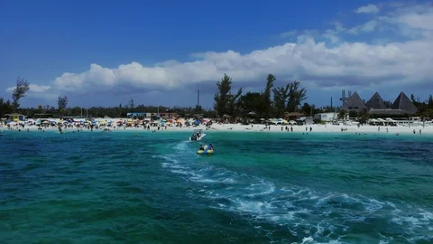 Aerial View of Yellow Flying Fish Towable Ride at Taino Beach, Bahamas Stock Footage 108729736