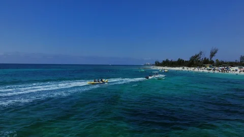 Aerial View of Yellow Flying Fish Towable Ride at Taino Beach, Bahamas Stock Footage 108729806
