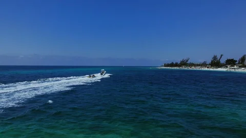 Aerial View of Yellow Flying Fish Towable Ride at Taino Beach, Bahamas Stock Footage 108730396