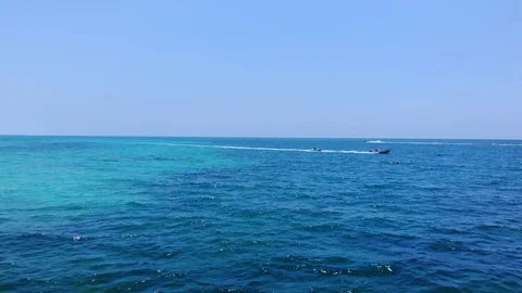 Aerial View of Yellow Flying Fish Towable Ride at Taino Beach, Bahamas Video stock 108730861
