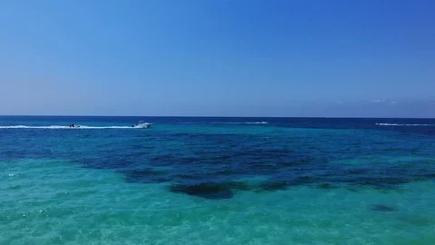 Aerial View of Yellow Flying Fish Towable Ride at Taino Beach, Bahamas Stock Footage 108731249