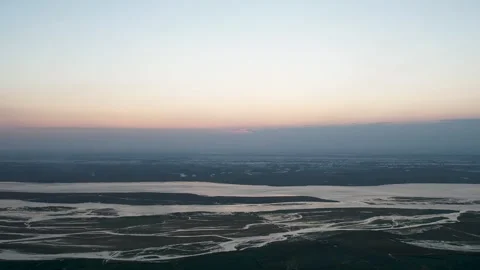 Aerial View of the Yellow River Flowing Through Vast Plains at Sunset Stock Footage 342326934