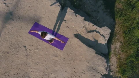 Aerial view, yoga practice, practicing pose Stock Footage 285878344