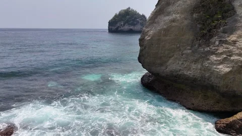 Aerial view of young lady on Diamond Beach, Nusa Penida, Bali. Indonesia Stock Footage 319924571