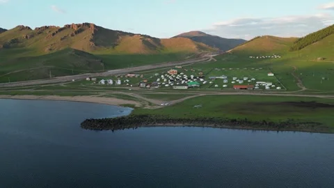 Aerial view of yurt resort compound on Terkhiin Tsagaan Lake, Mongolia Stock Footage 345419089
