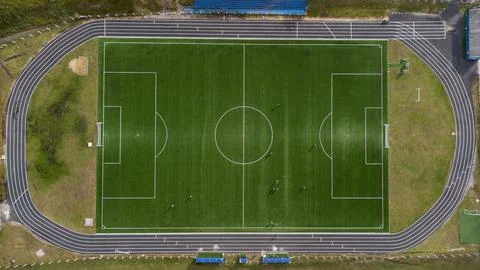 Aerial view from zenith/nadir angle down of a soccer field on a sunny day, wh Stock-Fotos