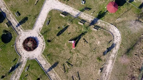 Aerial view, zoom in, of an empty playground. Stock Footage 124497513