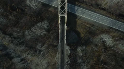 Aerial view(camera down) of the Railroad Bridge above Highway with Cars Stock Footage 165475651