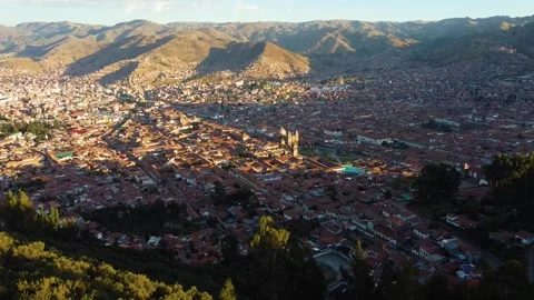 Aerial viewpoint of cusco peru cityscape at sunset Stock Footage 346568626