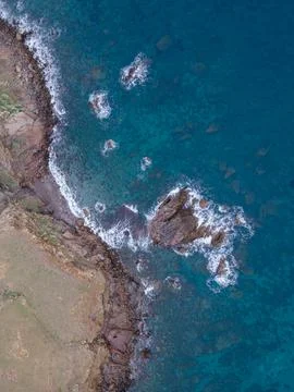 Aerial views with 4k drone, centinal direction of rocks and sea. Stock Photos