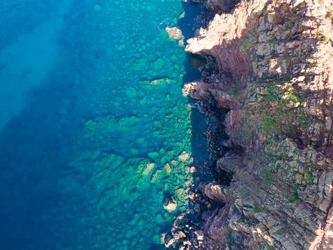 Aerial views with 4k drone, centinal direction of rocks and sea. Stock Photos