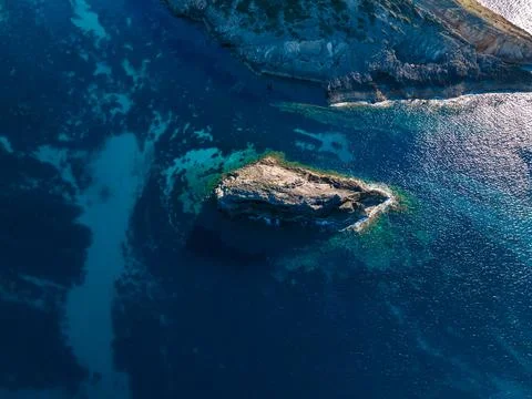 Aerial views with 4k drone, centinal direction of rocks and sea. Stock Photos