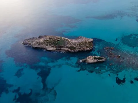 Aerial views with 4k drone, centinal direction of rocks and sea. Stock Photos