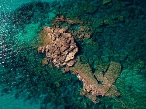 Aerial views with 4k drone, centinal direction of rocks and sea. Stock Photos