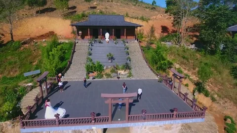 Aerial views of a Buddhist Temple on top of the mountain Video stock 80780908