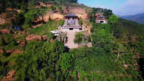 Aerial views of a Buddhist Temple on top of the mountain Stock Footage 80783744