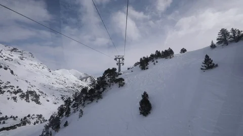 Aerial views from a cable car on the ski slopes Stock Footage 102851785