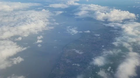  	Aerial views of the clouds inside an airplane Stock Footage 223108063