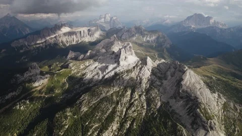 Aerial views of the dolomite mountain range at golden hour Stock Footage 221349852