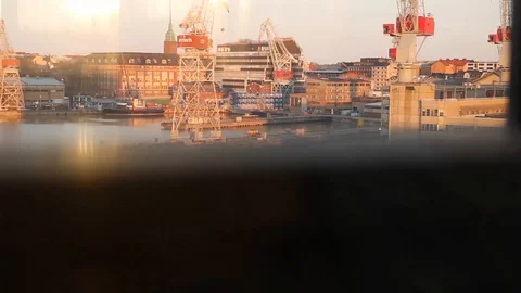 Aerial views of elevator going up overlooking the industrial area. Port area. Stock Footage 124585084