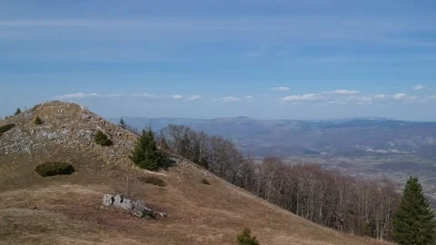 Aerial Views of Fall Foliage Over Mountainscape Stock Footage 262634337